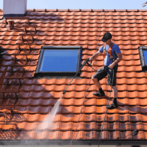A person spraying the roof